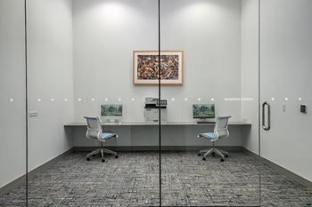 Fully-equipped business center, conference room, and huddle rooms